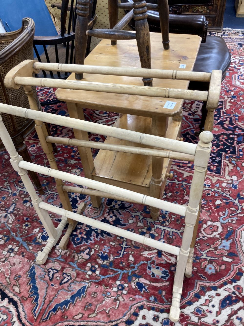 A Victorian pine two tier washstand, width 62cm, two towel rails and a provincial stool
